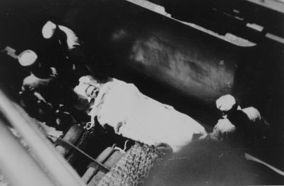 066b_Off_Korea_-_Bringing_aboard_wounded_from_US_Brush_Sept_26_1950_28Hal_Brown_Photo29.jpg