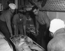 068_Off_Korea_-_Bringing_aboard_wounded_from_US_Brush_Sept_26_1950_28Hal_Brown_Photo29.jpg